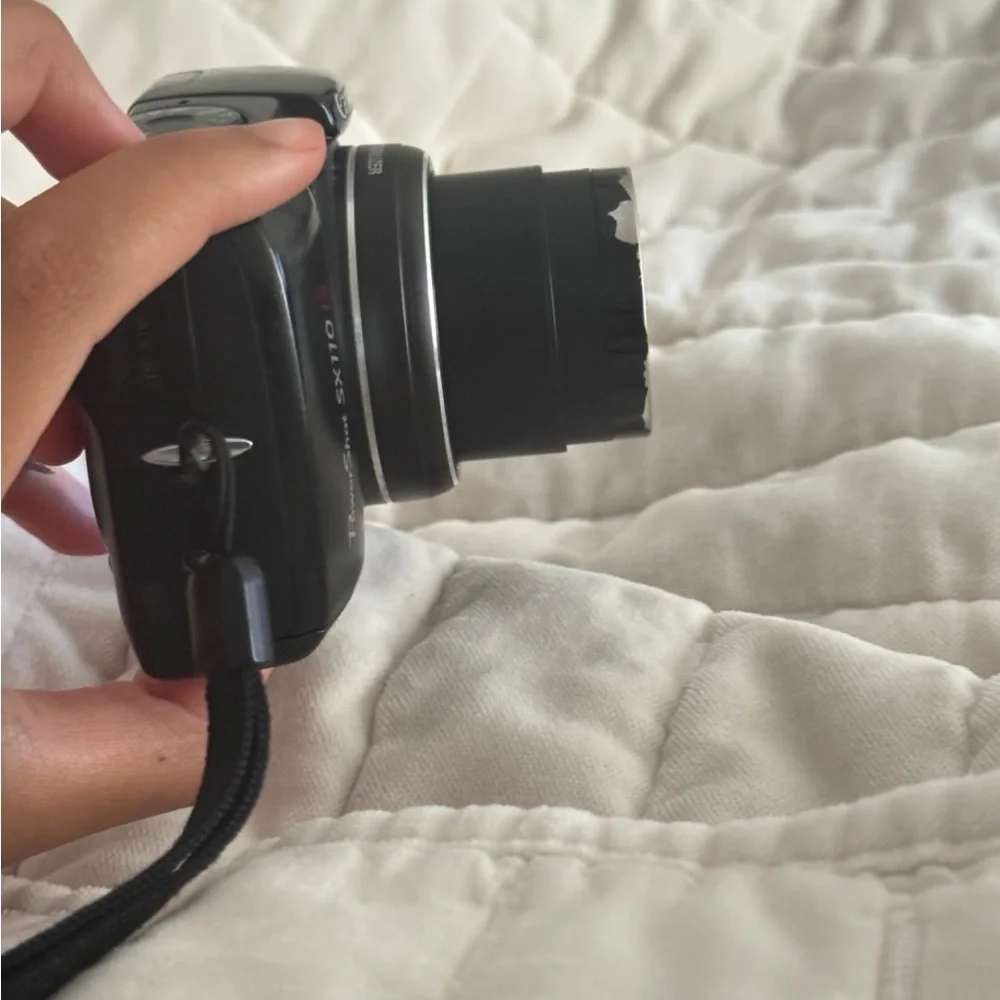 Canon Black Digital Camera with Blue Display